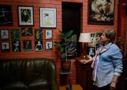 Legendary Soviet gymnast Larisa Latynina, holder of the record for the most Olympic gold medals by a gymnast shows her pictures in home, in village Kalyanino