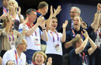 Joined by Sophie, Countess of Wessex and Sir Tim Lawrence, Catherine and William cheer with the crowd. (Photo by Pascal Le Segretain/Getty Images)