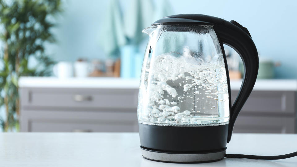An electric glass kettle boiling water