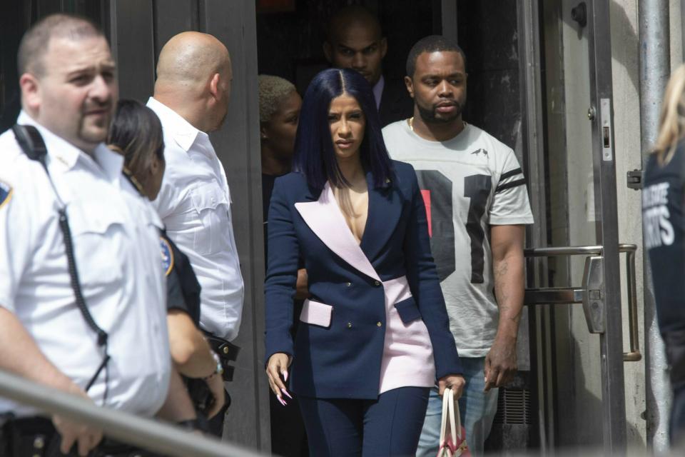 Grammy-winning rapper Cardi B leaves Queens County Criminal Court, Tuesday, June 25, 2019, in New York. (AP Photo/Mary Altaffer)