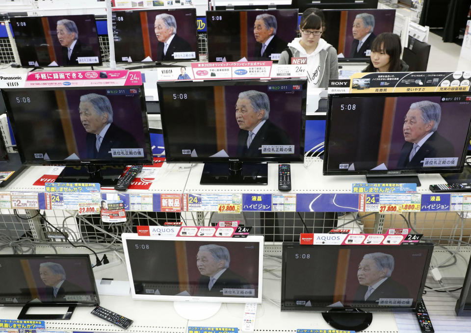 TV screens show news program reporting on Emperor Akihito's abdication, at an electrical appliance store in Urayasu, near Tokyo Tuesday, April 30, 2019. Akihito announced at a ceremony that he is abdicating, in his final official address to his people. (Yukie Nishizawa/Kyodo News via AP)