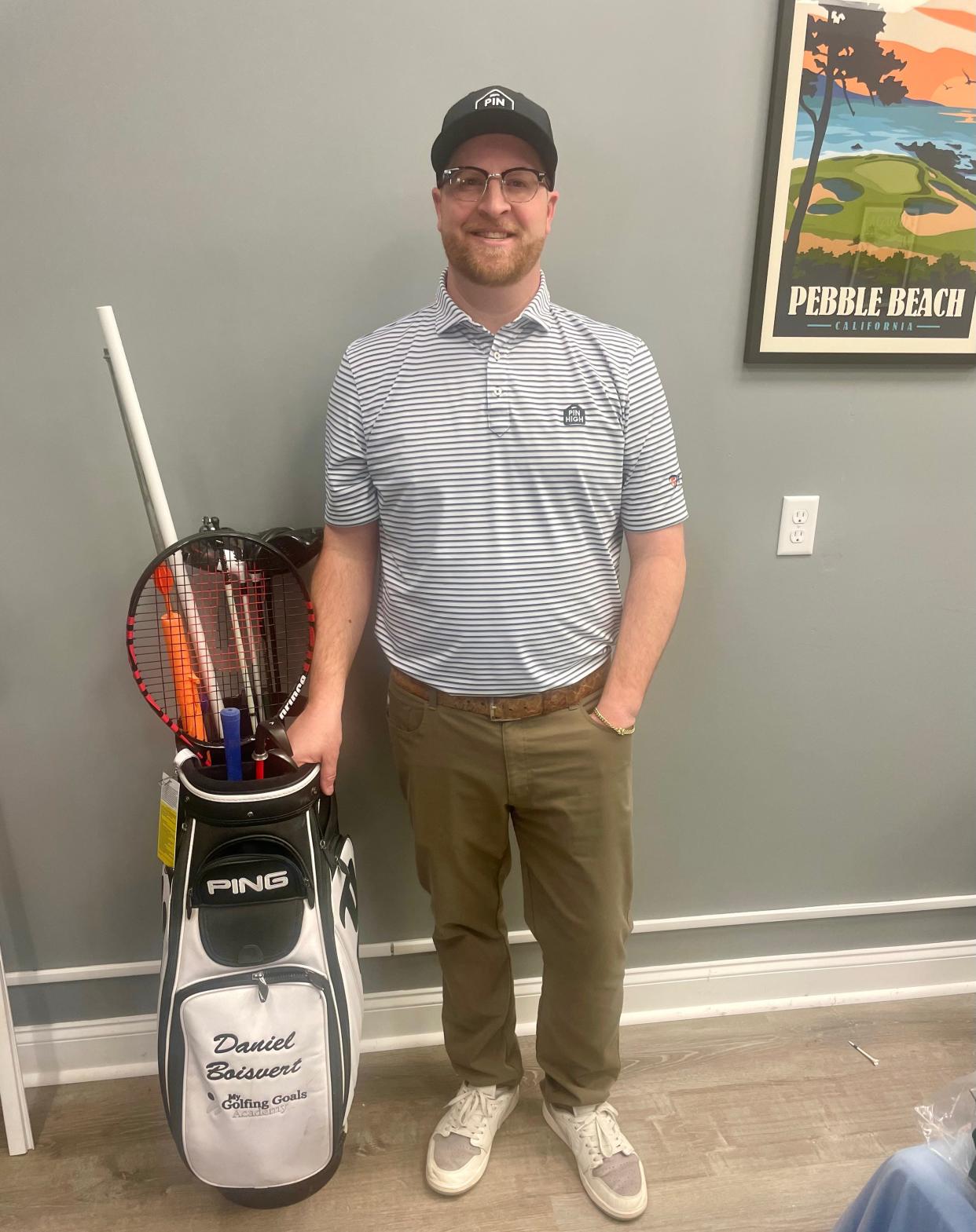 Dan Boisvert poses with his Ping golf bag.