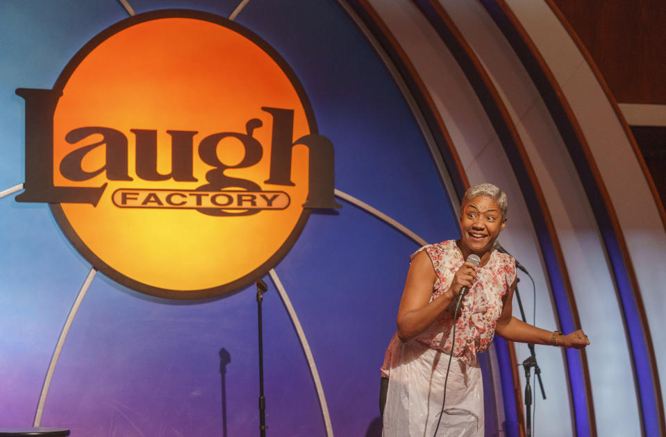 Stand-up comedian and actress Tiffany Haddish entertains guests at Laugh Factory Hollywood, during its free Thanksgiving meal Thursday, Nov. 23, 2023, in Los Angeles. (AP Photo/Damian Dovarganes)