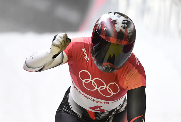 Canada’s Elisabeth Vathje pumps her fist after finishing the women’s skeleton event at the 2018 Winter Olympics in PyeongChang. (Getty)