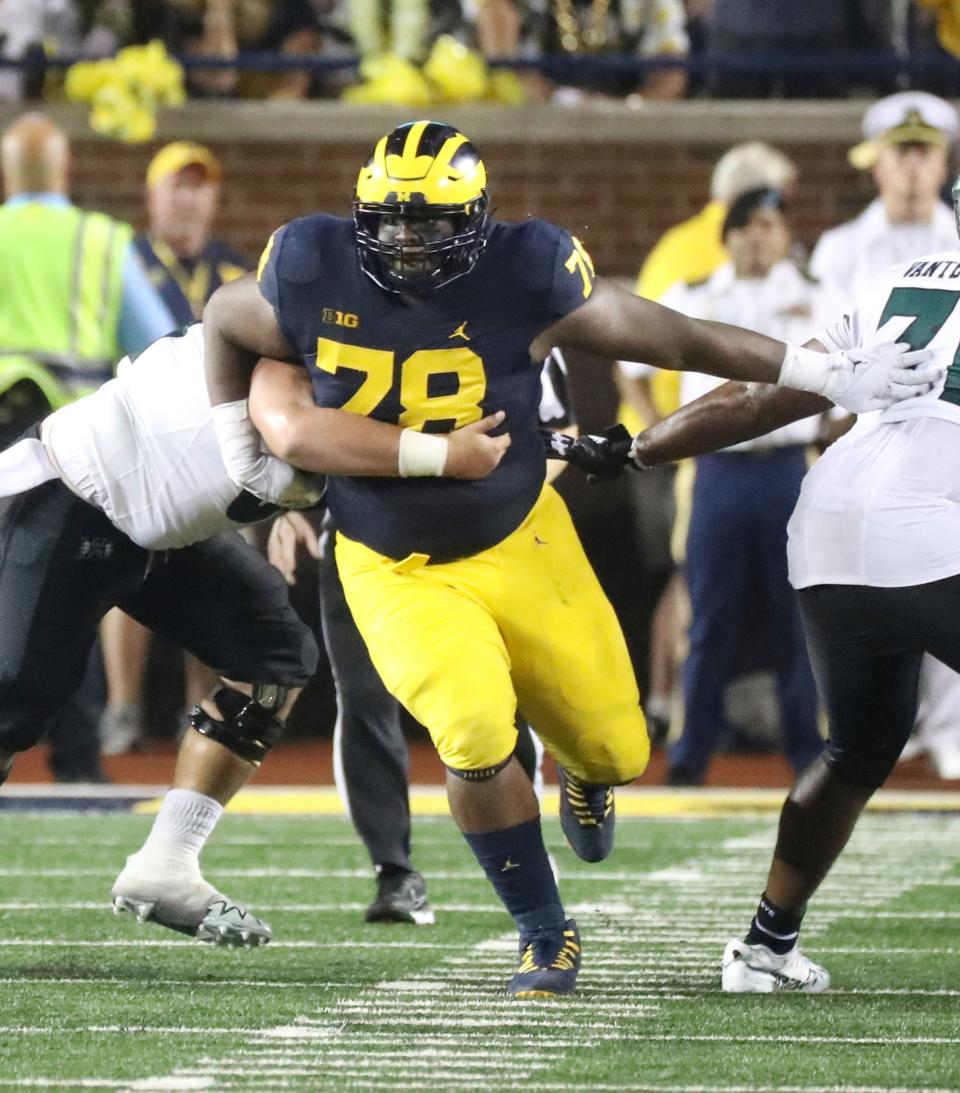 Michigan Wolverines defensive lineman Kenneth Grant (78) rushes against the Hawaii Rainbow Warriors during first-half action at Michigan Stadium in Ann Arbor on Saturday, Sept. 10, 2022.