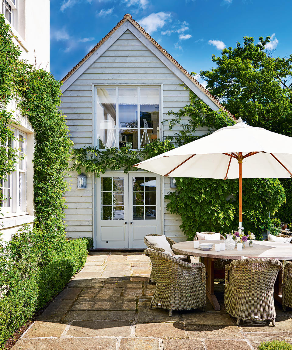 Provide patio shade with an umbrella