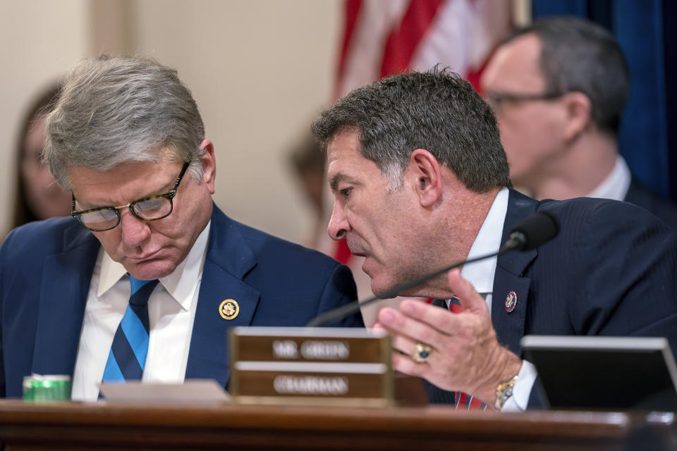 Chairman Mark Green, R-Tenn., right, confers with Rep. Michael McCaul, R-Texas, left, as Republicans on the Homeland Security Committee move to impeach Secretary of Homeland Security Alejandro Mayorkas over the crisis at the U.S.-Mexico border, at the Capitol in Washington, Tuesday, Jan. 30, 2024. (AP Photo/J. Scott Applewhite)