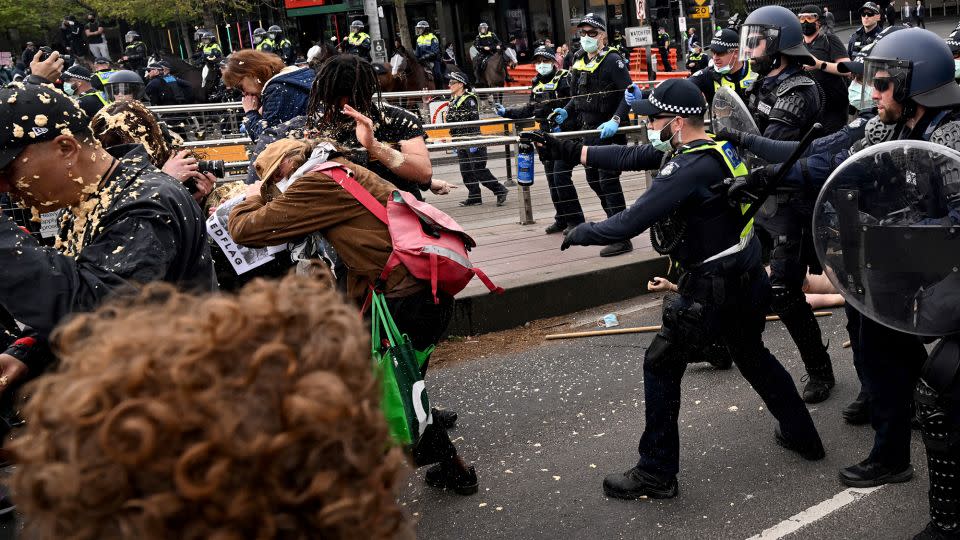 Protesters confront police outside the Land Forces 2024 arms fair in Melbourne on September 11, 2024. - William West/AFP/Getty Images