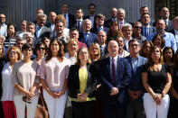 <p>Spanish parliamentarians observe a minute of silence for the victims of the Manchester attack, outside parliament in Madrid, Spain on May 23, 2017. R(Paul Hanna/Reuters) </p>