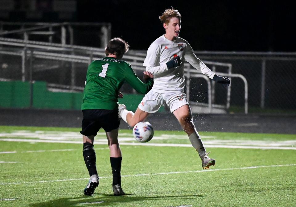 Mansfield Senior's Justin Crall works his way past Clear Fork's Liam Beer during the Tygers' 4-1 victory over the Colts on Monday night.