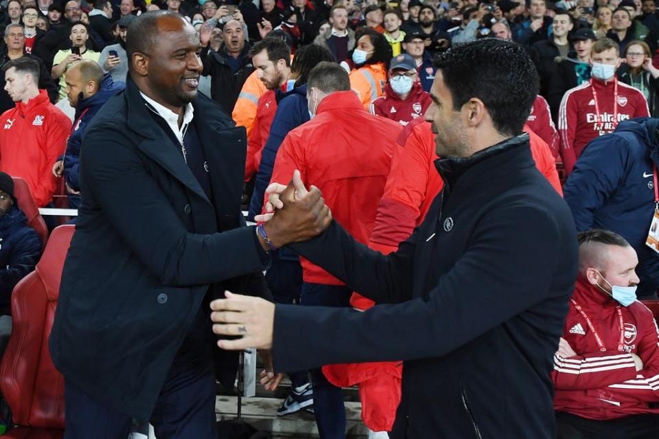 Patrick Vieira and Mikel Arteta embrace before Arsenal play Crystal Palace (Arsenal FC via Getty Images)