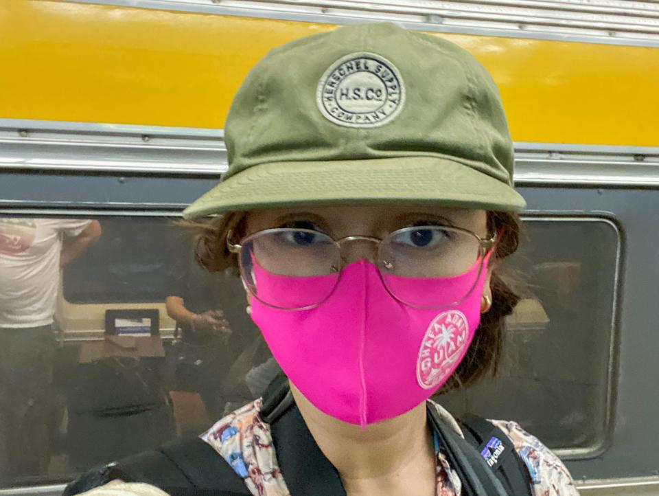 The author in front of the train car