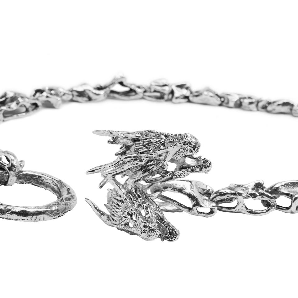 <p>This closer look at Dany's chain shows the detail on the three dragon sigil.</p>