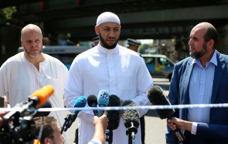 Mohammed Mahmoud (centre), an imam at Finsbury Park Mosque in London, saved the attacker who drove his van into a group of Muslims on Monday, witnesses say