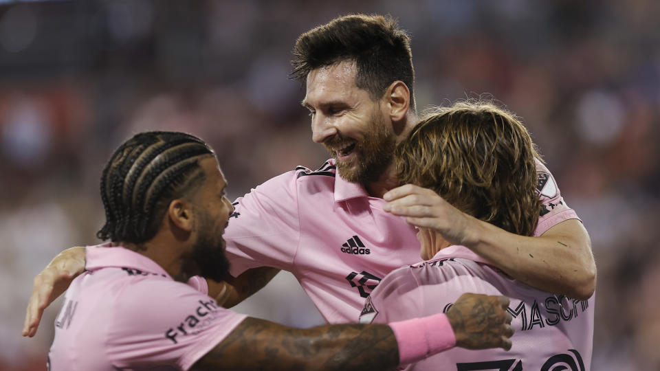 Inter Miami forward Lionel Messi celebrates with teammates, top, after his goal against the New York Red Bulls during an MLS soccer match at Red Bull Arena, Saturday, Aug. 26, 2023, in Harrison, N.J. (AP Photo/Eduardo Munoz Alvarez)