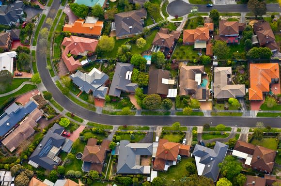 Aerial view of a neighborhood crowded with expensive homes.