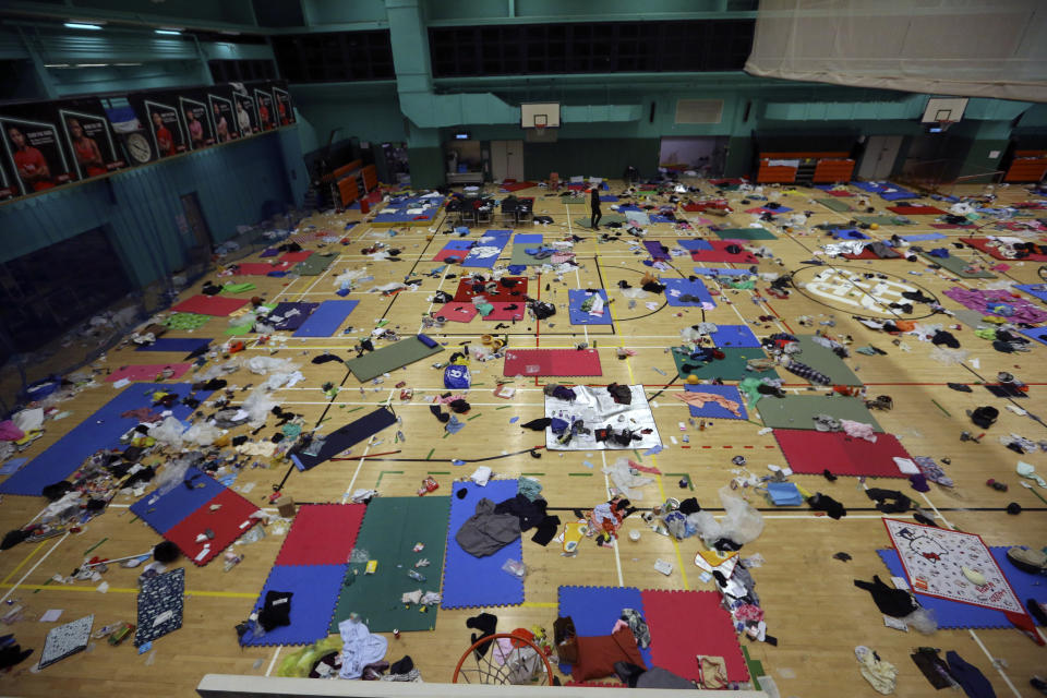 Belonging of protesters are left in the campus of the Polytechnic University in Hong Kong, Wednesday, Nov. 20, 2019. A small group of protesters refused to leave Hong Kong Polytechnic University, the remnants of hundreds who took over the campus for several days. They won't leave because they would face arrest. Police have set up a cordon around the area to prevent anyone from escaping. (AP Photo/Ahmad Ibrahim)