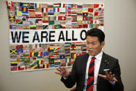 Japanese legislator Genki Sudo speaks during an interview with the Associated Press in Tokyo on Nov. 4, 2020. Sudo, a former mixed martial artist, wrestler and kickboxer, argues that the Olympics won’t be fair to the athletes. Some can practice, but many can't because of the pandemic.(AP Photo/Koji Ueda)