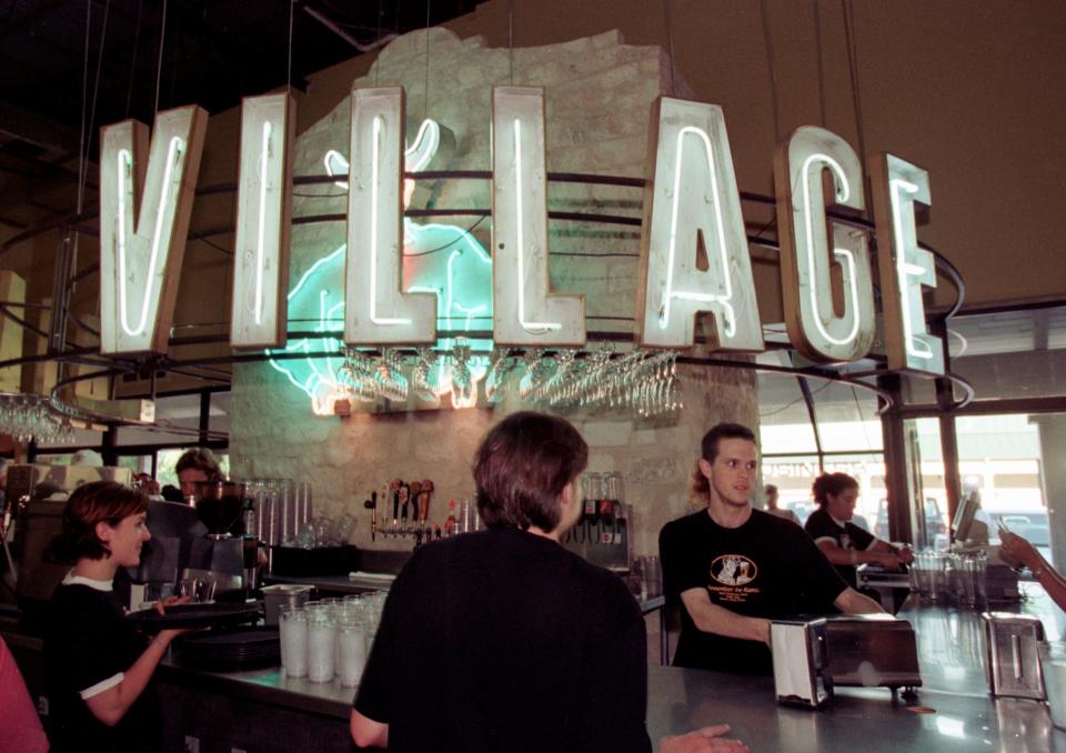 Servers queued at the bar during a private party the week before the Alamo Drafthouse Village opened in July 2001. The second location of the Austin-born theater chain was formerly a beloved arthouse, serving Austin cinephiles for decades before the Drafthouse team took over.