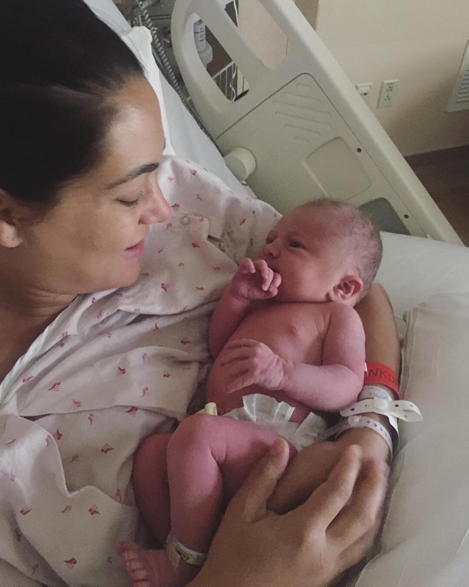 "From the moment I saw her I was in love," Brie gushed on Instagram after <a href="https://people.com/parents/brie-bella-daniel-bryan-welcome-daughter-birdie-joe/" rel="nofollow noopener" target="_blank" data-ylk="slk:welcoming daughter Birdie Joe Danielson;elm:context_link;itc:0;sec:content-canvas" class="link ">welcoming daughter Birdie Joe Danielson</a> on May 9, 2017, adding that she is "her Daddy's mini me!!" The <em>Total Bellas</em> star shares Birdie with her fellow WWE pro wrestler husband Bryan Danielson, known professionally as Daniel Bryan. 