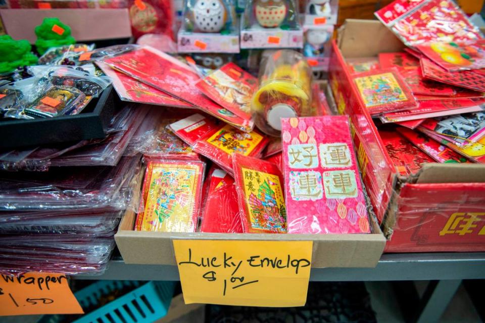 Lucky red envelopes, used to pass out money for the Lunar New Year, on sale at Lee’s Grocery, an Asian supermarket in Biloxi, on Monday, Jan. 24, 2022.