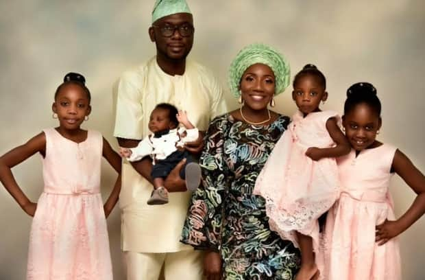 Ibrahim Odunayo Kassim poses with his wife Mayowa and their children.  (Tope Akindele Photography - image credit)