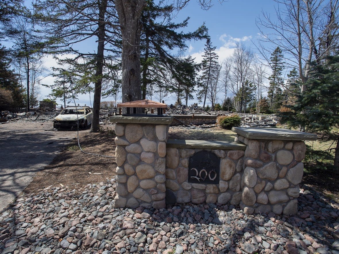 A fire-destroyed property registered to Gabriel Wortman at 200 Portapique Beach Road in Portapique, N.S., is seen in a May 2020 file photo. It has been purchased by the provincial government for $120,000. (Andrew Vaughan/Canadian Press - image credit)