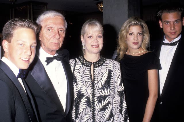 <p>Ron Galella, Ltd./Ron Galella Collection via Getty</p> The Spelling family with Nick Savalas in 1993