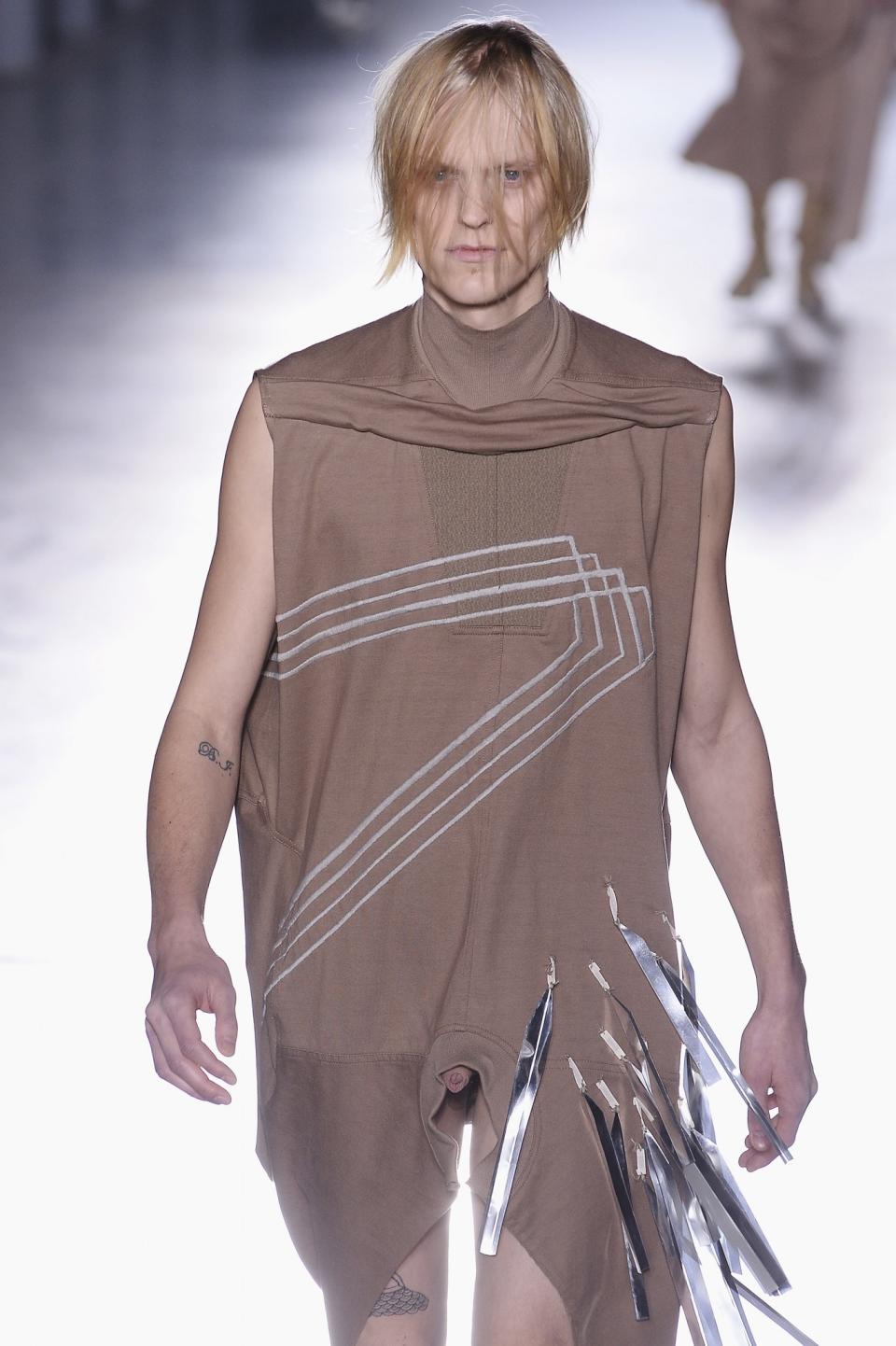 <p>Rick Owens spawned a whole host of play on words with his AW15 menswear show. Several designs featured special peepholes showing models’ bare genitals, giving the front row the shock of their lives. <i>[Photo: Getty]</i> </p>