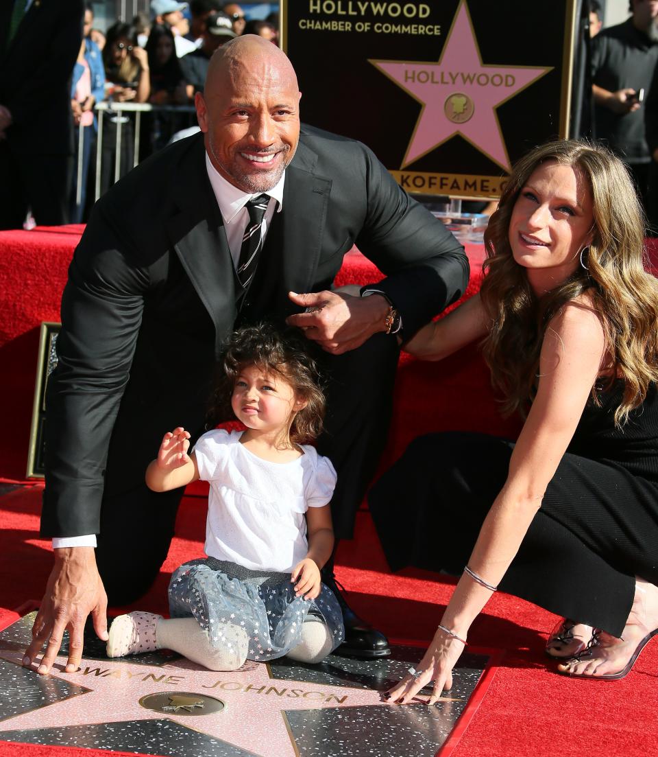 LOS ANGELES, CA - DECEMBER 13: Dwayne Johnson, Lauren Hashian and daughter Jasmine Johnson attend a ceremony honoring him with a star on The Hollywood Walk of Fame on December 13, 2017 in Los Angeles, California.(Photo by JB Lacroix/ WireImage)