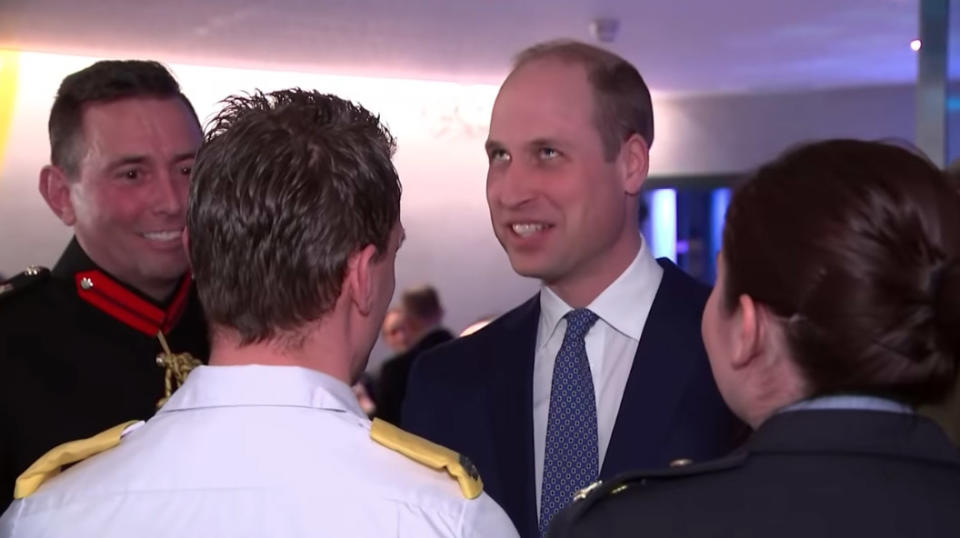 Prince William rolls eyes at the Guinness Storeroom while talking to a paramedic