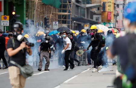 Anti-extradition bill protesters gather near Sham Shui Po Police Station in Hong Kong