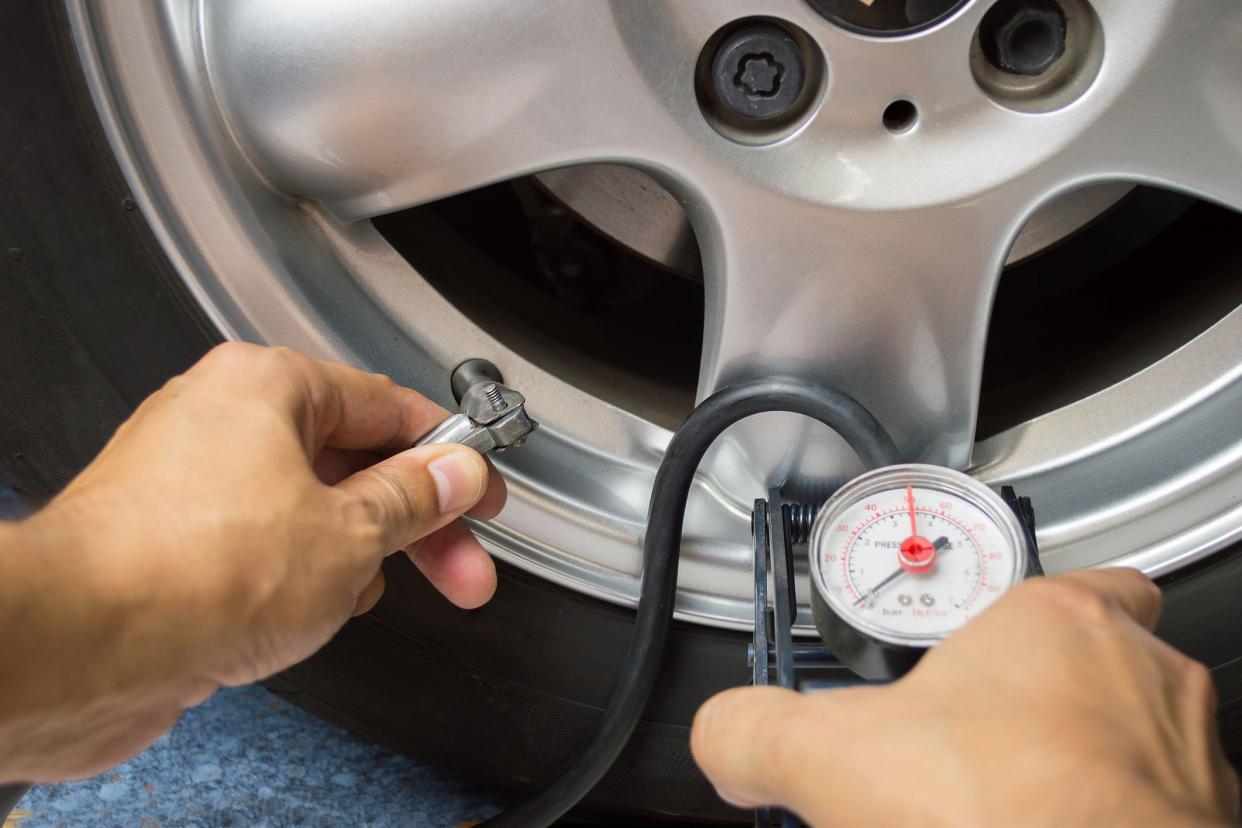 checking tire pressure