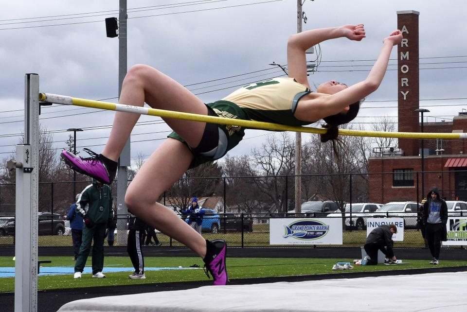 Alexis Le of Howell won the high jump in the Lansing Catholic Relays.