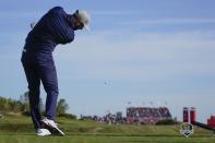 Team USA's Dustin Johnson hits a shot off the tee during a foursome match the Ryder Cup at the Whistling Straits Golf Course Friday, Sept. 24, 2021, in Sheboygan, Wis. (AP Photo/Jeff Roberson)