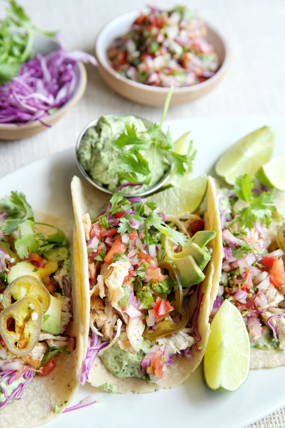 <p>Take Taco Tuesday to a whole new level.</p><p>Get the recipe from <a href="/cooking/recipe-ideas/recipes/a48415/grilled-chicken-tacos-with-avocado-crema-recipe/" data-ylk="slk:Delish;elm:context_link;itc:0;sec:content-canvas" class="link ">Delish</a>.</p>