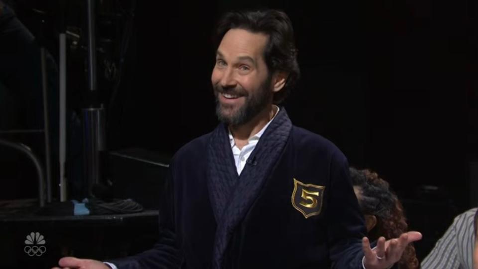 “So I have to say as a former cast member, it is very special being a five-timer,” Wiig said shortly before being interrupted by Paul Rudd who asks the “Bridesmaids” star if he could be part of the sketch where she gets her jacket. NBC / SNL