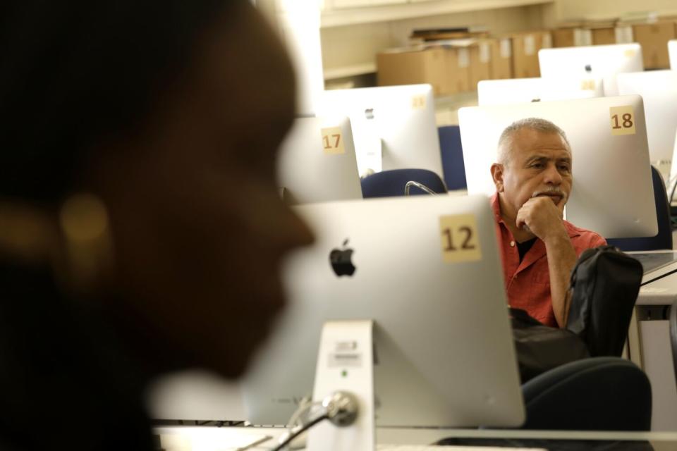 Journalism student Juan Mendoza listens in class.