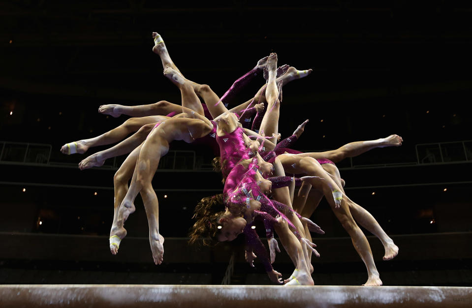 (EDITORS NOTE: Multiple exposures were combined in camera to produce this image.) McKayla Maroney practices on the beam before the start of competition on day 4 of the 2012 U.S. Olympic Gymnastics Team Trials at HP Pavilion on July 1, 2012 in San Jose, California. (Photo by Ezra Shaw/Getty Images)