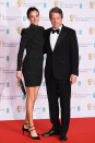 <p>As is Hugh Grant, with wife Anna Elisabet Eberstein sporting a high-neck LBD (little black dress).</p>