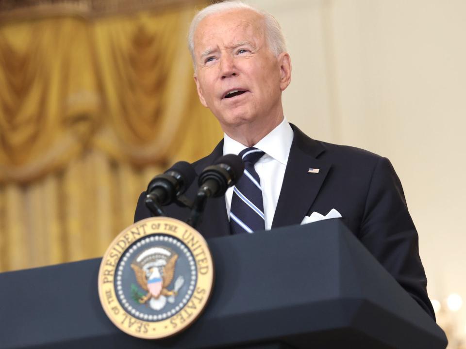 President Joe Biden speaking at a White House Podium in the White house