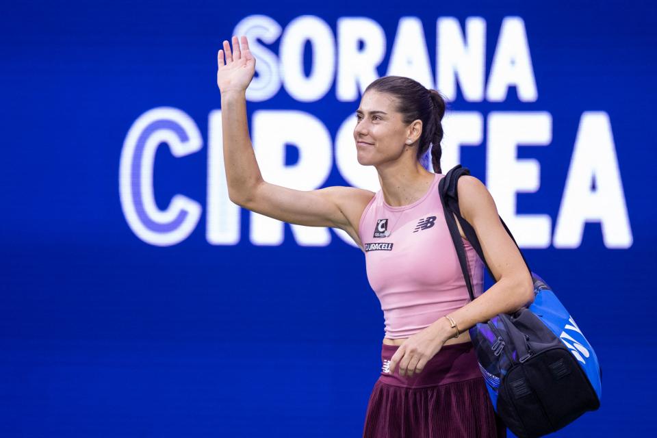 Sorana Cistia waves to the crowd.