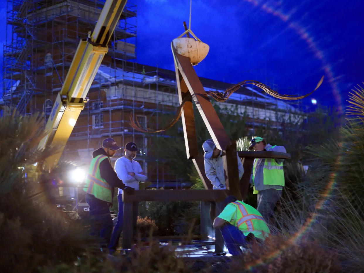 Construction crews install a statue in downtown St. George during a past iteration of the popular Art Around the Corner outdoor gallery. A new set of sculptures and other 3D outdoor art pieces are set to be installed April 1 for the 2023-24 season.