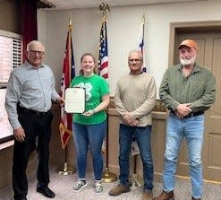 Coshocton County Commissioners Dane Shyrock, Gary Fischer and Rick Conkle present Jenny Strickler, 4-H development educator for Ohio State University Extension Office of Coshocton County, with a proclamation declaring April 7 to 13 as 4-H week in Coshocton County. The proclamation urges residents of the community to take advantage of the opportunity to become more aware of the special program that gives youth the chance to learn together and on their own as part of Coshocton County 4-H.
(Credit: Photo provided by the Coshocton County Commissioners Office)