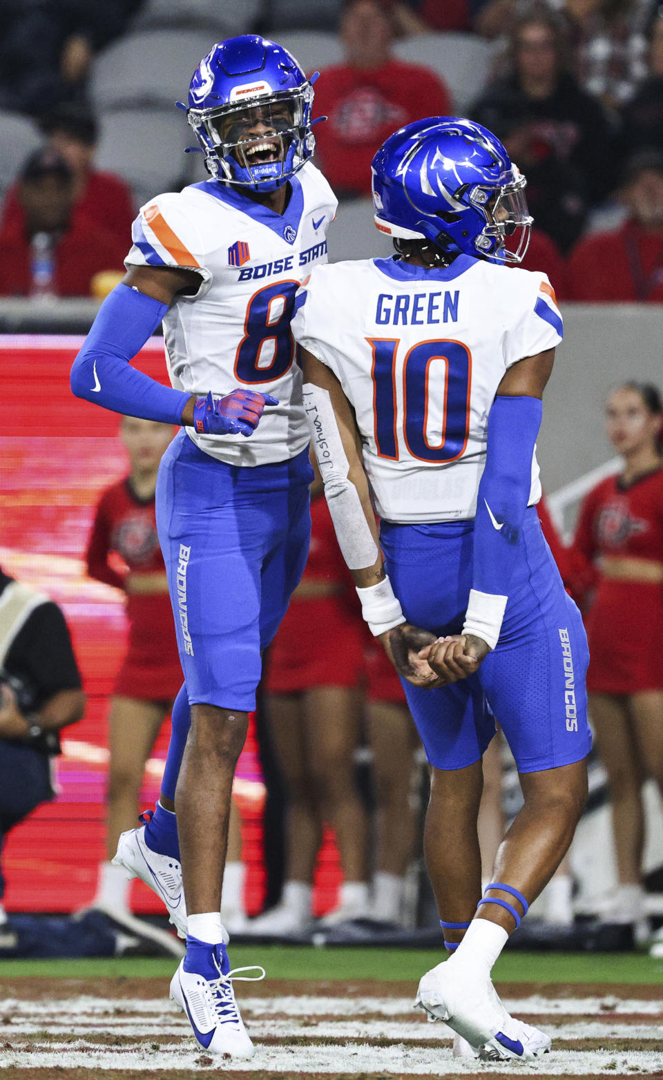 Boise State wide receiver Eric McAlister (80) and quarterback Taylen Green (10) celebrate a touchdown against San Diego State during an NCAA college football game Friday, Sept. 22, 2023, in San Diego. (Meg McLaughlin/The San Diego Union-Tribune via AP)