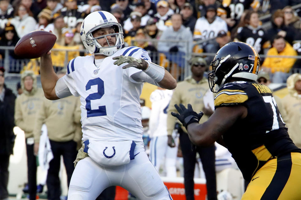 Indianapolis Colts quarterback Brian Hoyer (2) looks to pass as Pittsburgh Steelers nose tackle Javon Hargrave (79) rushes in the second half of an NFL football game , Sunday, Nov. 3, 2019, in Pittsburgh. (AP Photo/Gene J. Puskar)