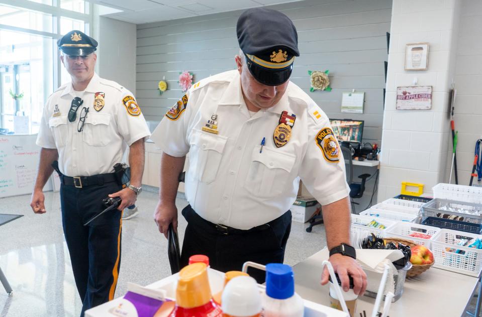 Newtown Police Department's Lt. Christian Joseph, left, and Capt. Jason Harris, right, stopping by the STARboro Cafe at the Council Rock STAR Center in Richboro on Thursday, Sept. 21, 2023. 
[Daniella Heminghaus | Bucks County Courier Times]
