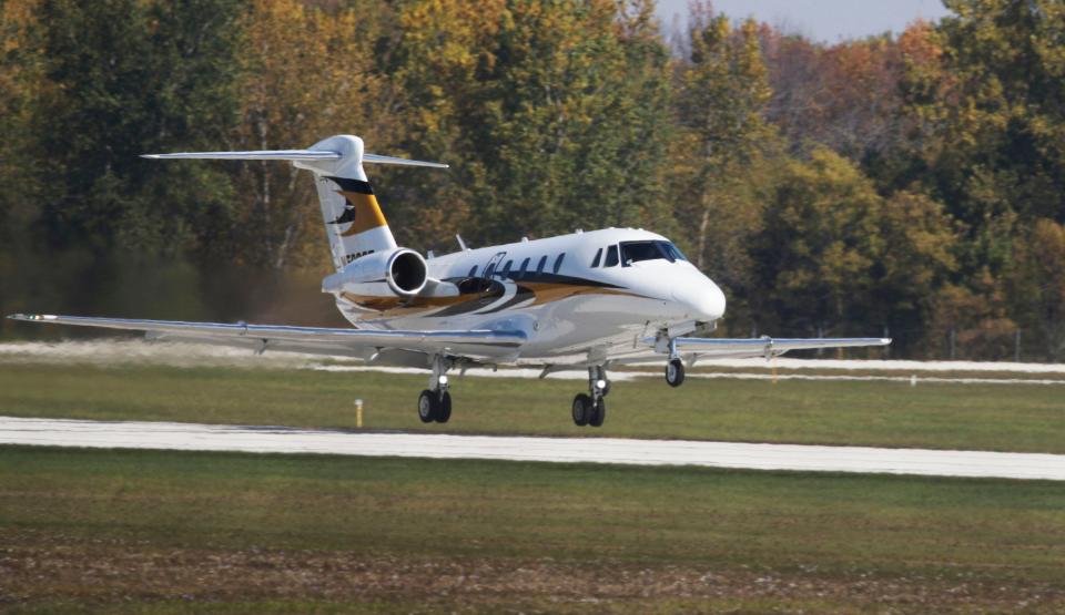 A jet takes off at the Manitowoc County Airport, Tuesday, October 11, 2022, in Manitowoc, Wis.