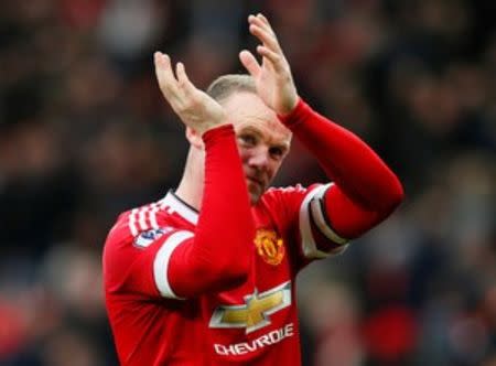 Britain Football Soccer - Manchester United v Leicester City - Barclays Premier League - Old Trafford - 1/5/16 Manchester United's Wayne Rooney applauds the fans at the end of the match Action Images via Reuters / Jason Cairnduff Livepic