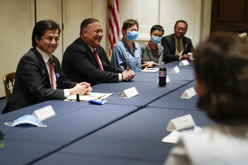 Secretary of State Mike Pompeo, second from left, meets with Chinese dissidents at the Richard Nixon Presidential Library, Thursday, July 23, 2020, in Yorba Linda, Calif. (AP Photo/Ashley Landis, Pool)
